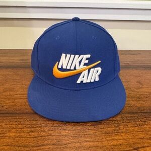 Nike Air True Adjustable Snapback hat in a blue, gold, and white colorway